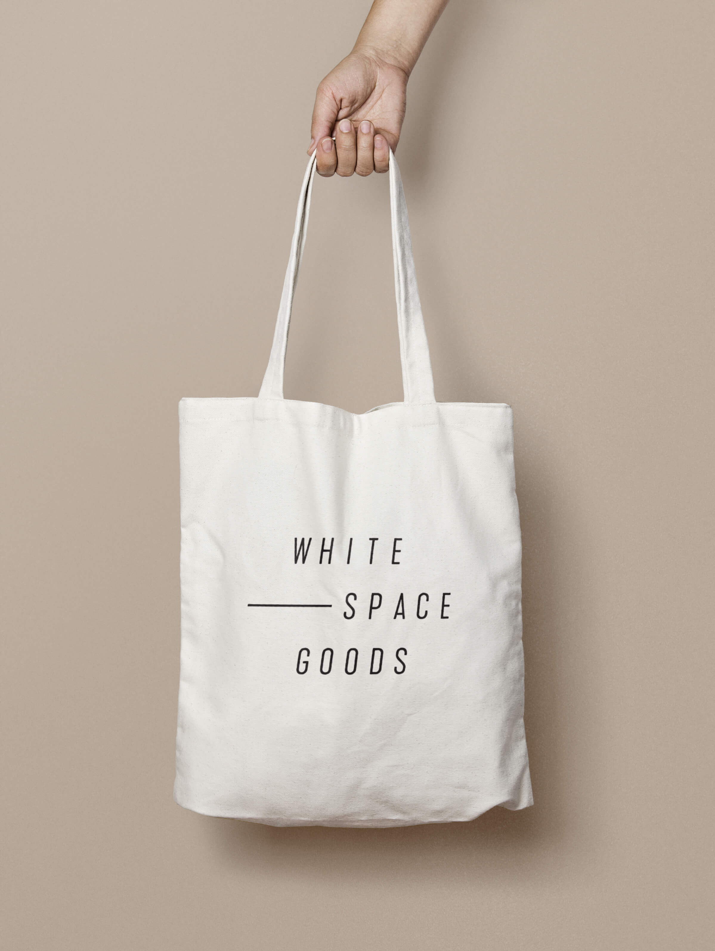 Whitespace Goods shopping bag for Ottawa-based handmade knitware and decor by graphic designer idApostle
